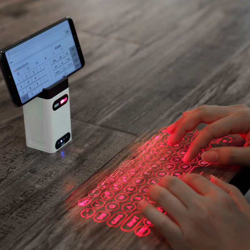Laser keyboard with red light using a phone