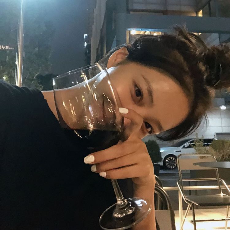 Girl drinking red wine