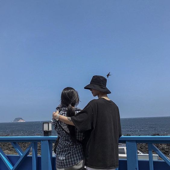 asian couple side hug