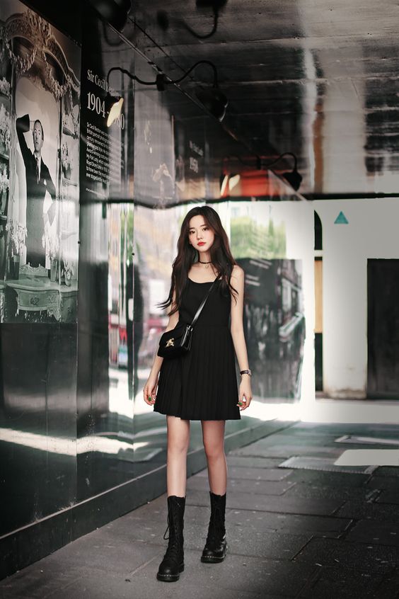 Korean woman wearing sleeveless mini Little black dress