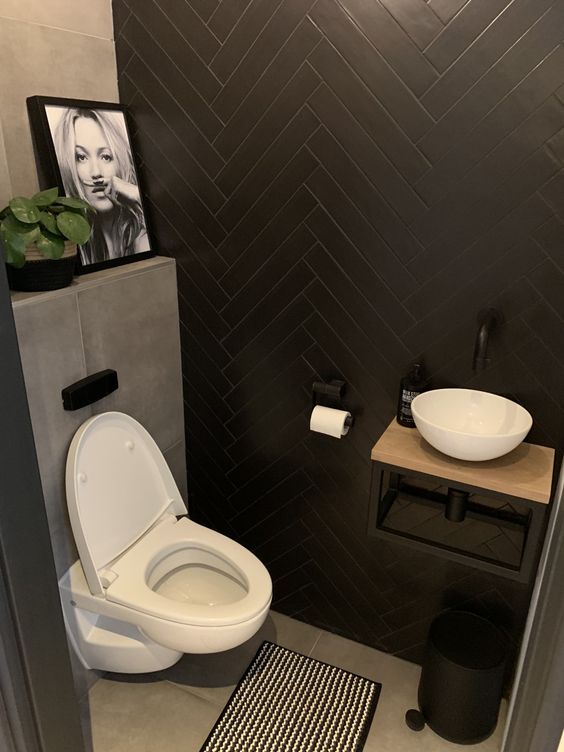 monochrome small bathroom with picture of Kate moss