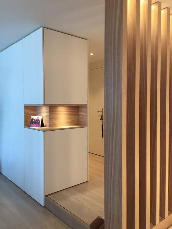 White shoe cabinet with shelving