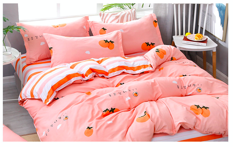 pink and orange print bed sheets and quilt cover