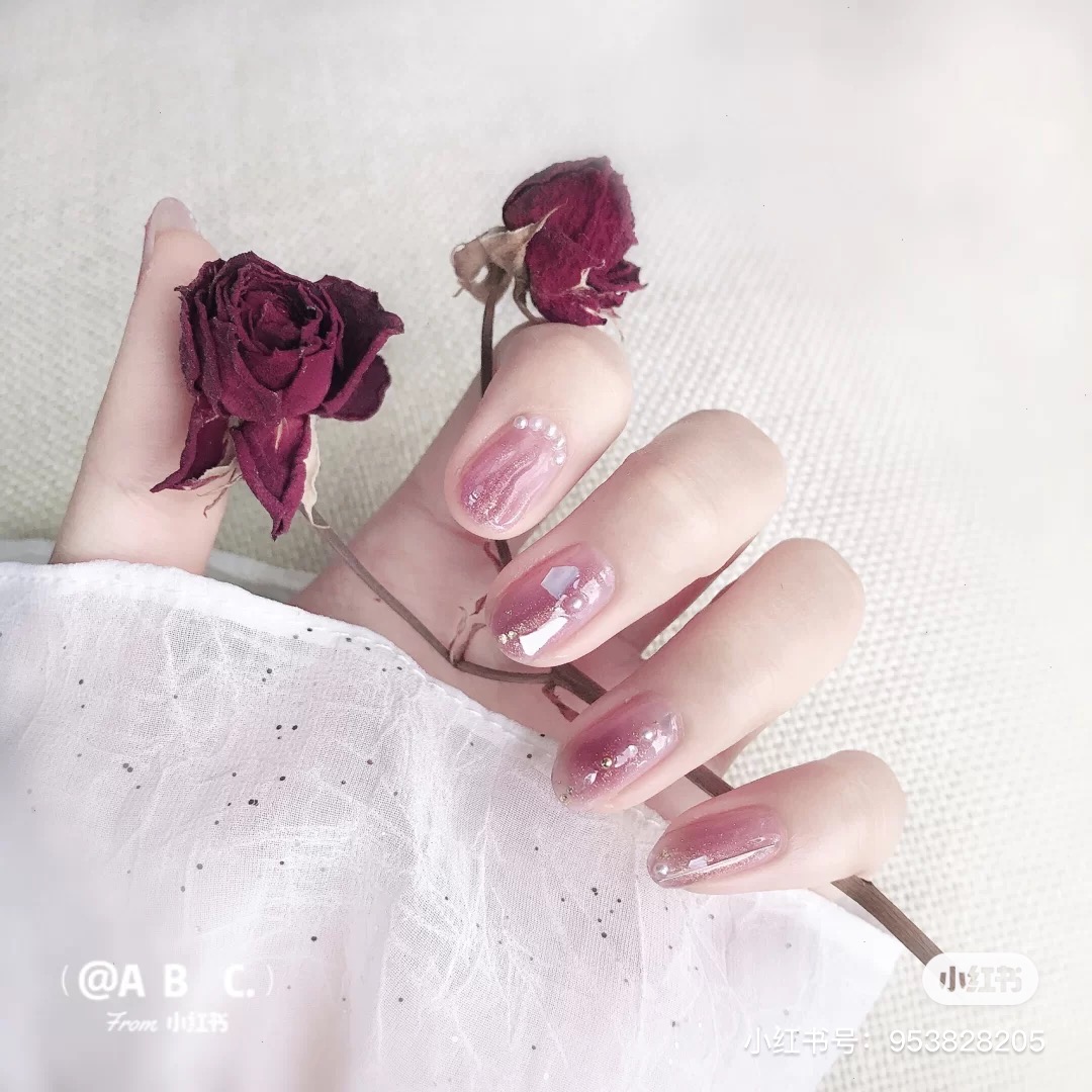 Purple pearls nail art