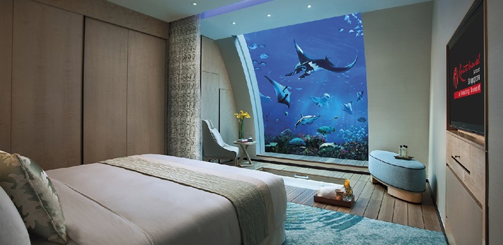 Resorts World Sentosa Equarius Hotel Ocean Suite bedroom aquarium daytime