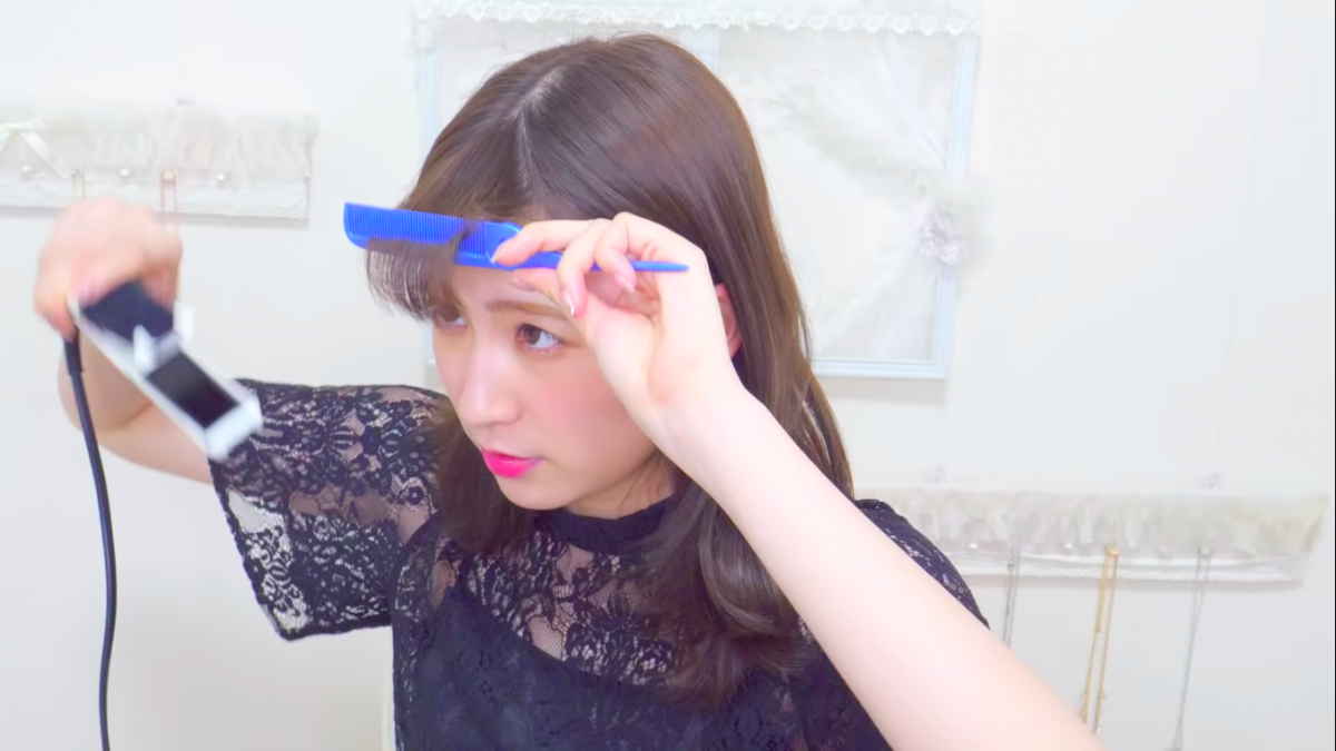Akari Yoshida straightening and combing bangs