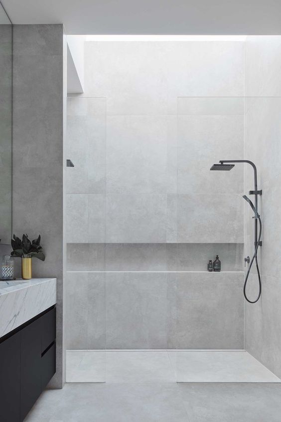 minimalist black and white bathroom with shower box