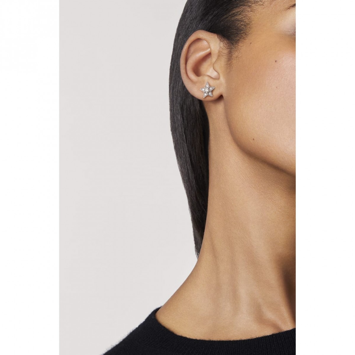 woman wearing small Chanel Comète Gèode Earrings