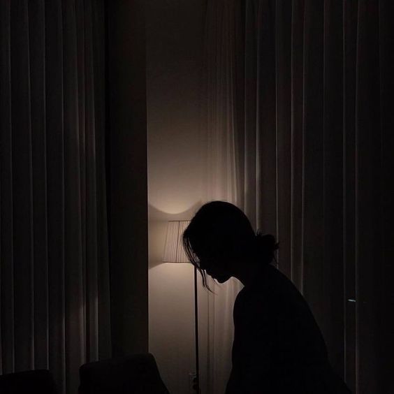 girl in a dark room