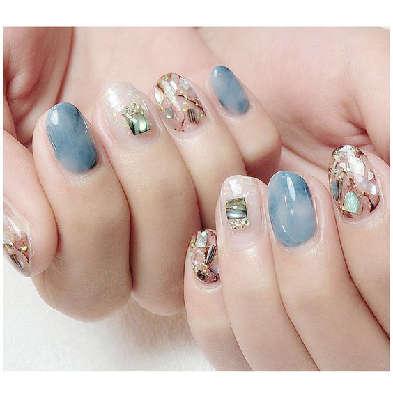 Mother of pearl shells nail art