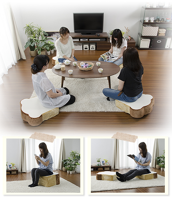 friends sitting on toast bread floor cushion seats around a living room table