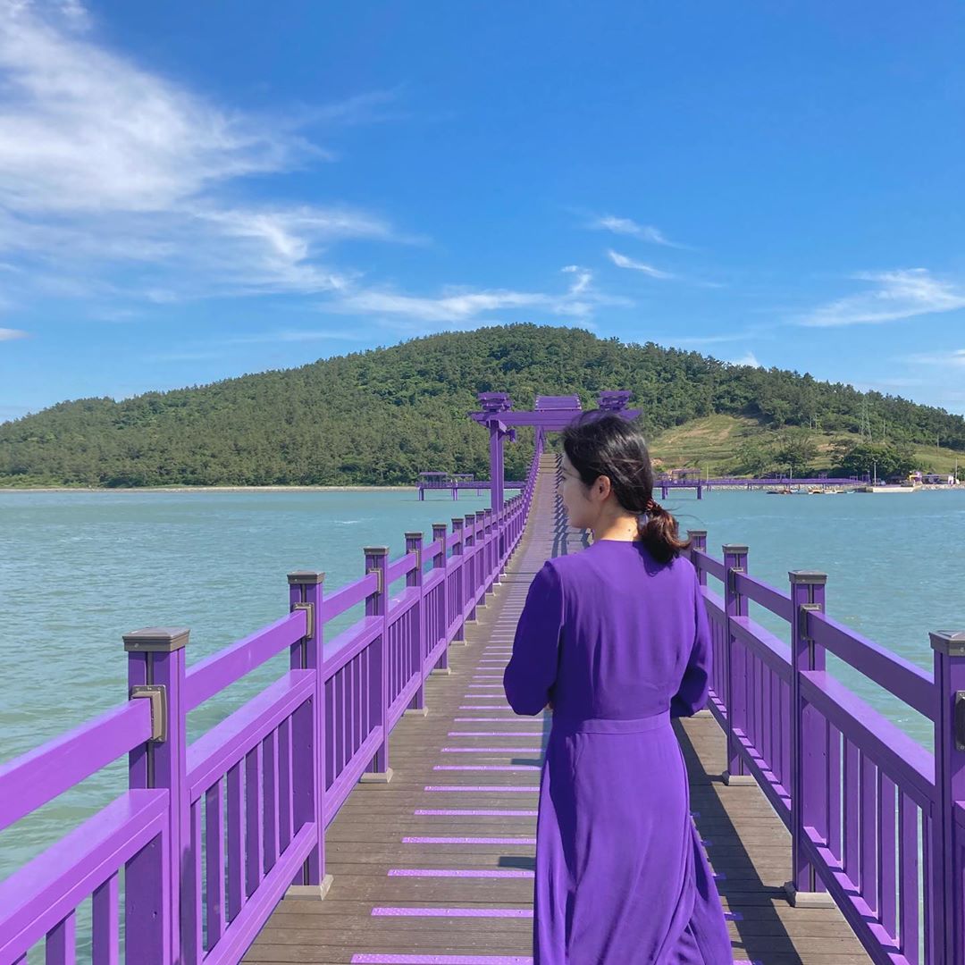 Girl in purple at the purple bridge in Banwol Island