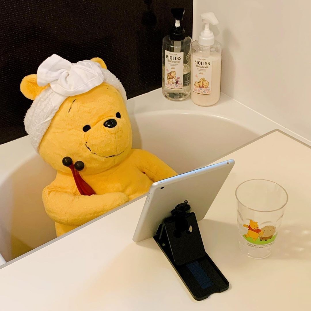 winnie-the-pooh plush toy daily life skincare routine in bathtub