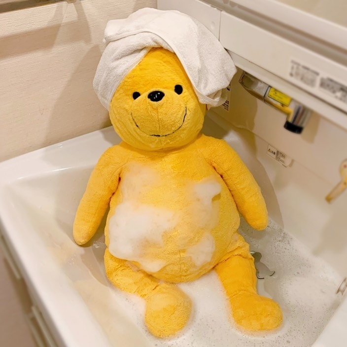 winnie-the-pooh plush toy daily life taking a bubble bath