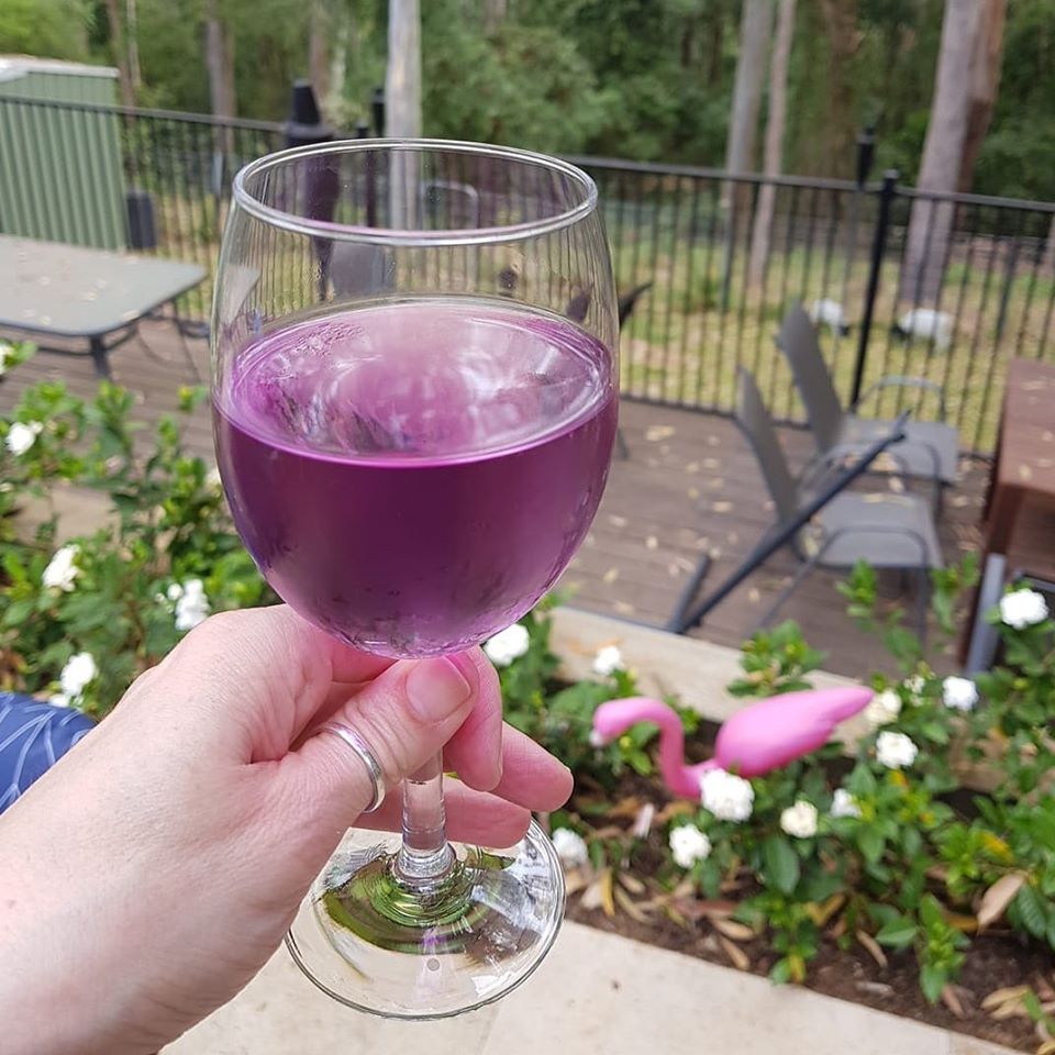 glass of purple coloured Purple Reign