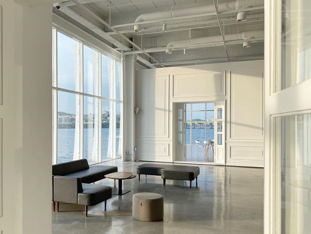 Seoul Wave Art Center empty minimalist interior with black furniture