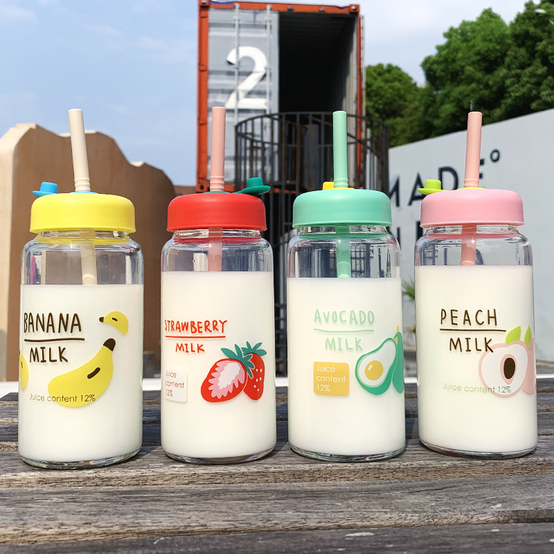 small strawberry, banana, peach, avocado milk glass water bottle