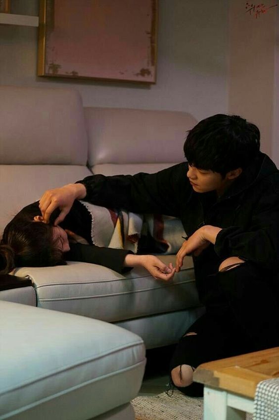 asian couple on a sofa