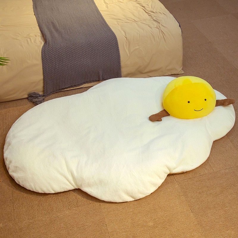poached egg floor rug with egg yolk pillow