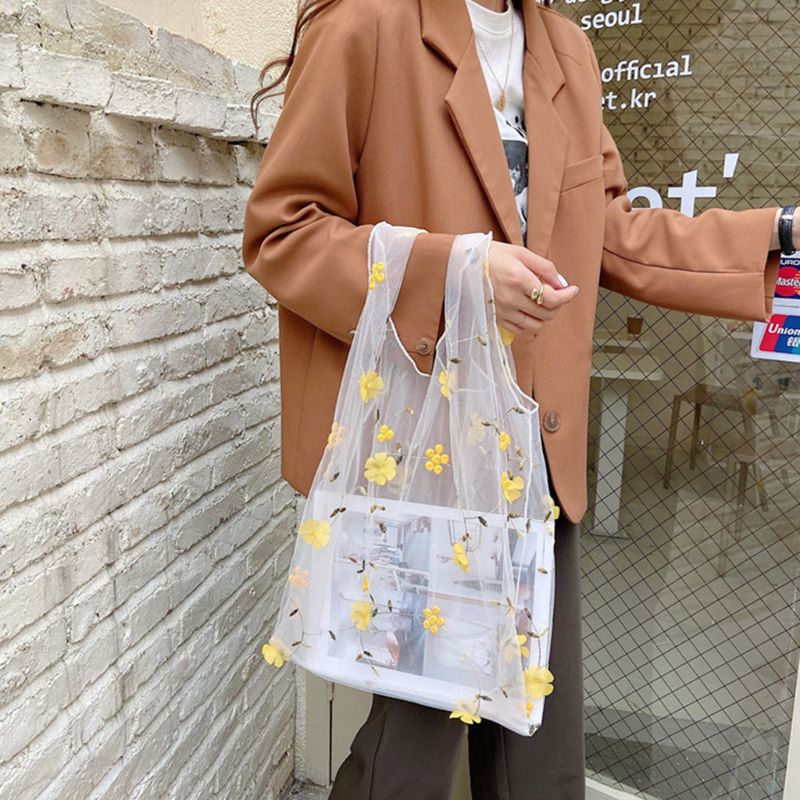 girl carrying Mesh floral grocery bags in white and yellow