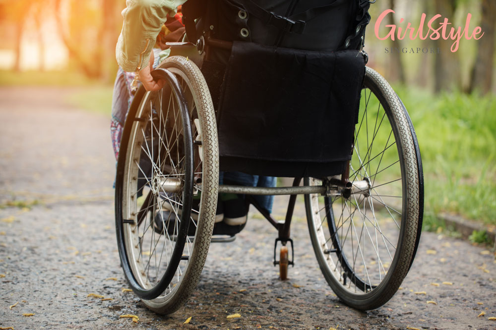 woman sitting on a wheelchair