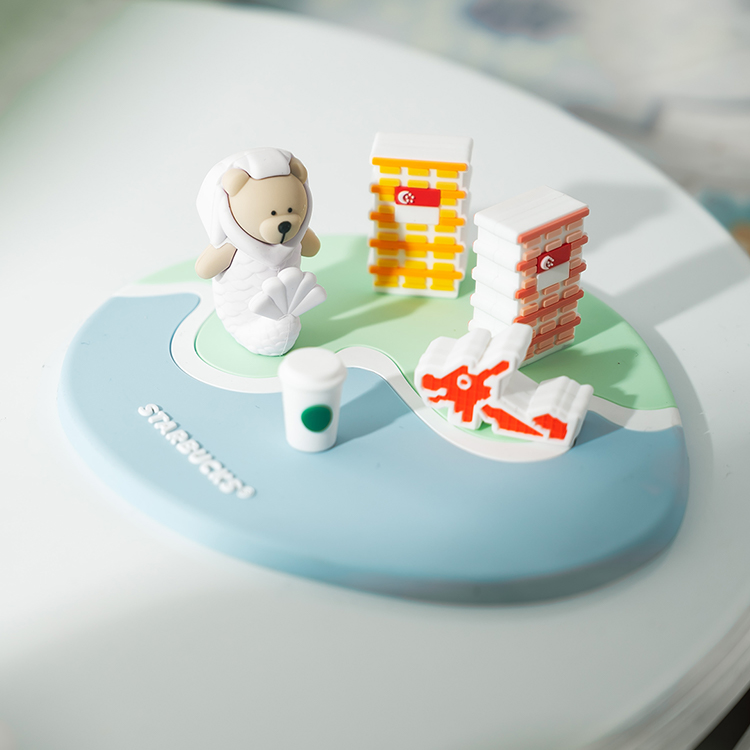 Starbucks Singapore cup lid with hub flats Merlion and playground