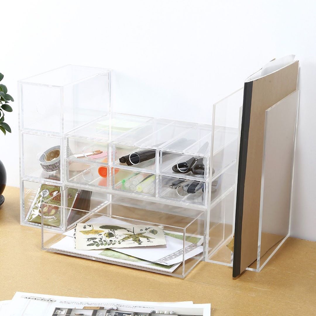 Muji's acrylic case for stationery on desk