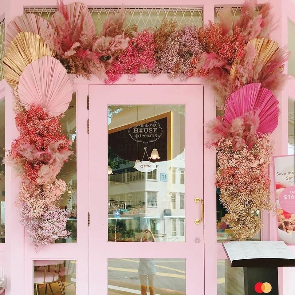 Little House of Dreams pink doorway with flowers