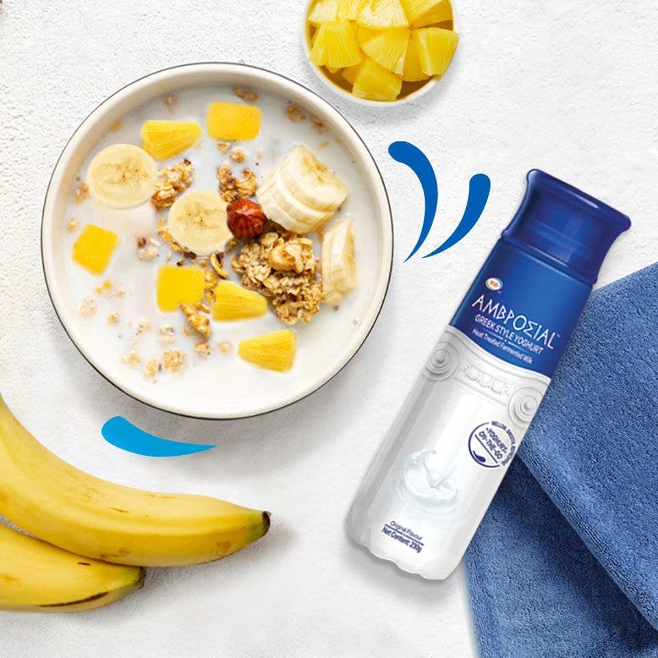 AMBROSIAL greek style yoghurt in a bottle and bowl with fruit