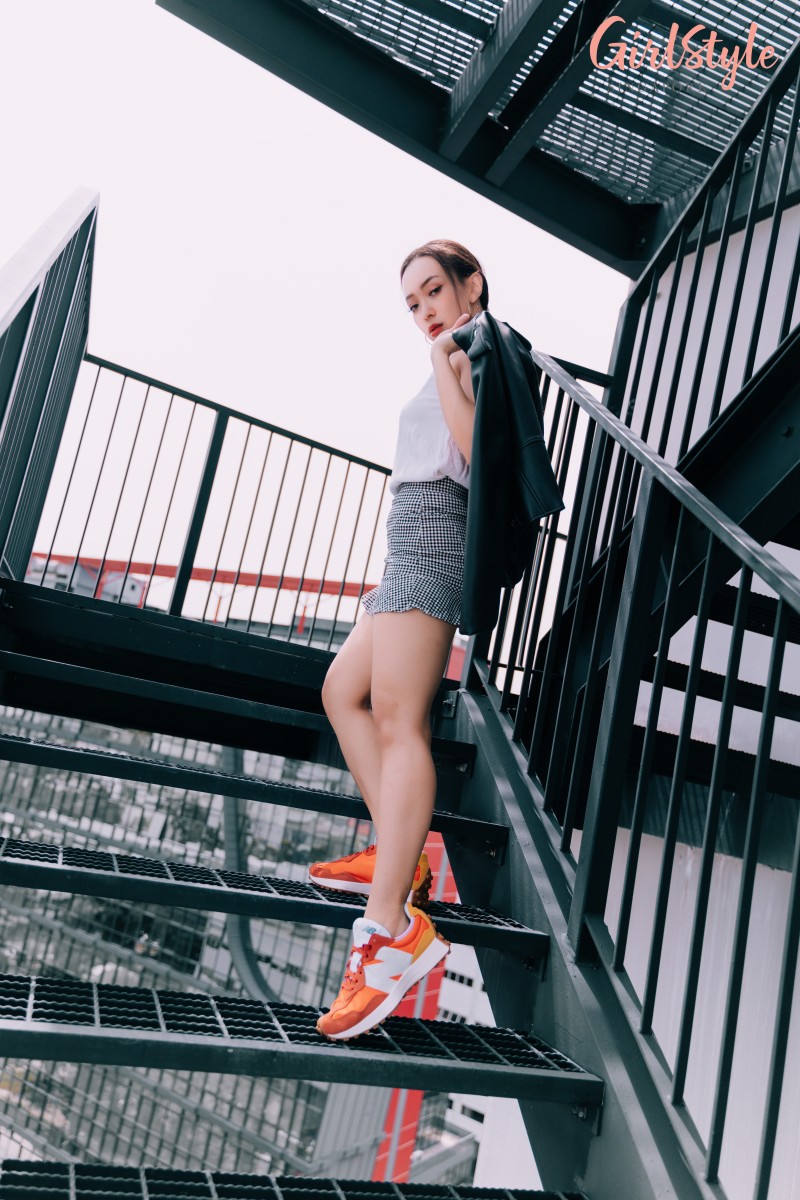 white top, checkered mini skirt. leather jacket + New balance orange & blue sneakers