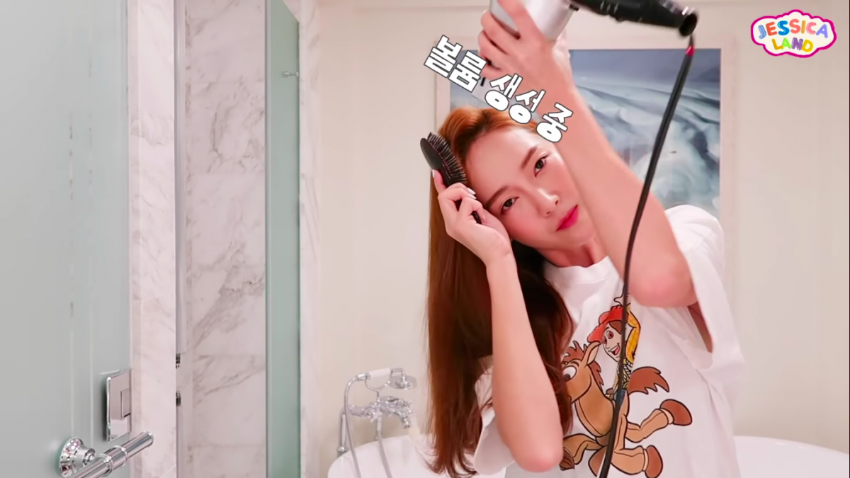 Jessica Jung blow drying hair