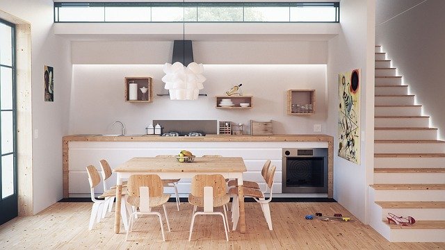 minimalist kitchen and dining room with wood tones