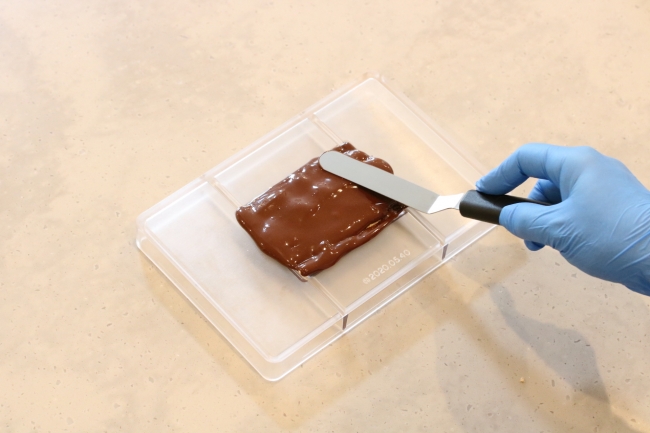 my kitkat making your own custom kitkat design smoothening the chocolate