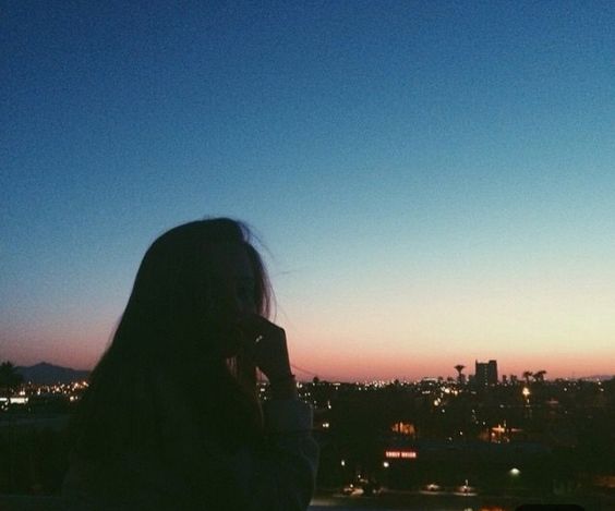Girl watching the sunset