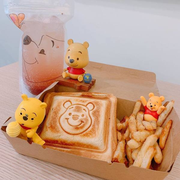 sandwiches and drink in Winnie-The-Pooh-Themed YUME coffee shop