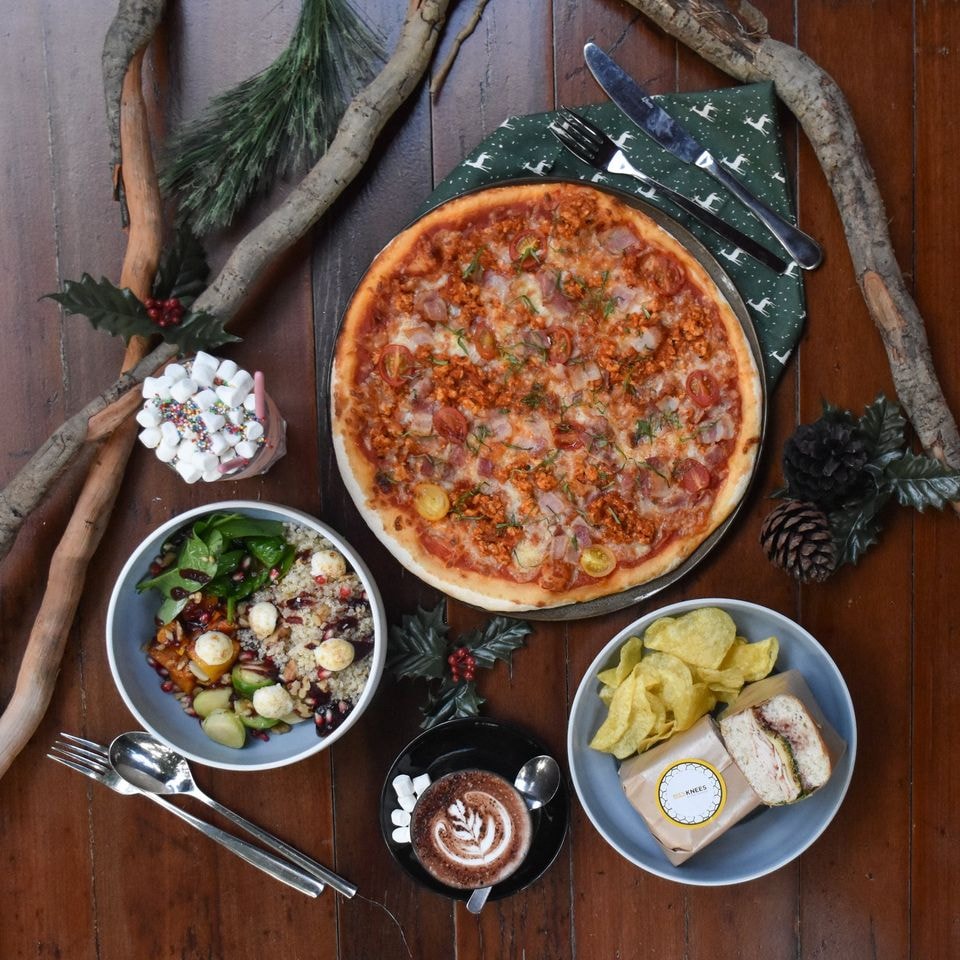 meat pizza, salad and fruit