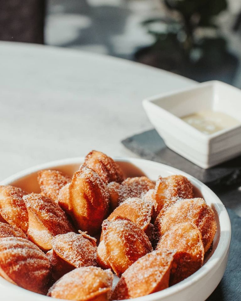 Voyage patisserie Madeleines on a plate