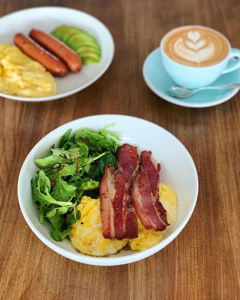 Kong Cafe breakfast scrambled eggs with bacon and salad with latte