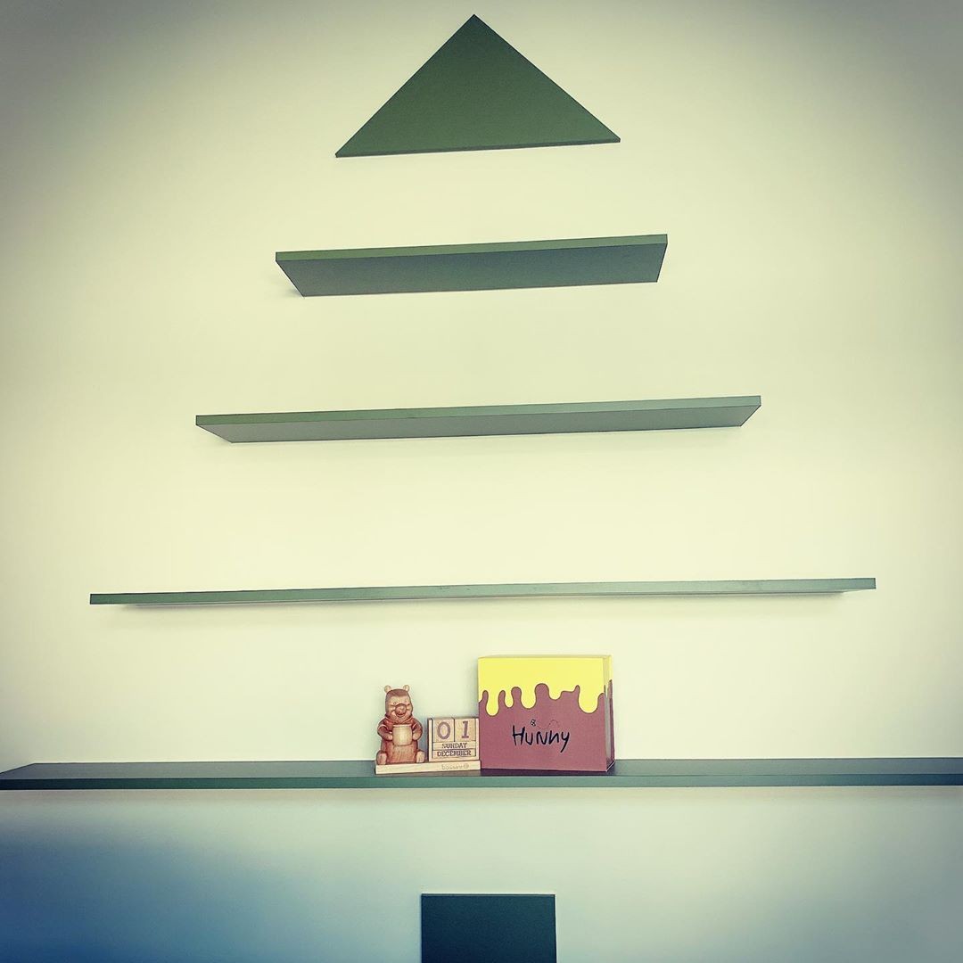 minimalist wall decor in Winnie-The-Pooh-Themed YUME coffee shop