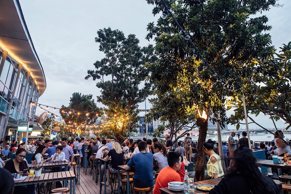 OverEasy outdoor seating with view of marina bay skyline