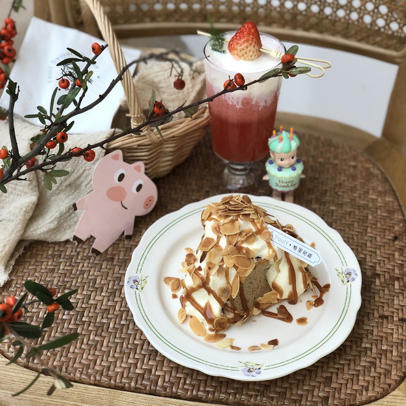 vintage korean cafe-style plate with cake and strawberry parfait