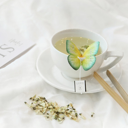 kKKOKDAM green butterfly tea bag in cup