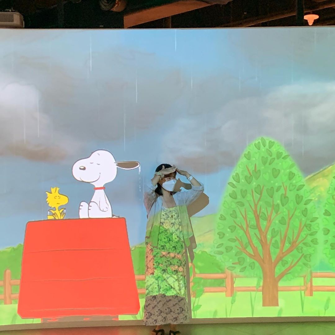 snoopy garden comic strip exhibit projected on screen