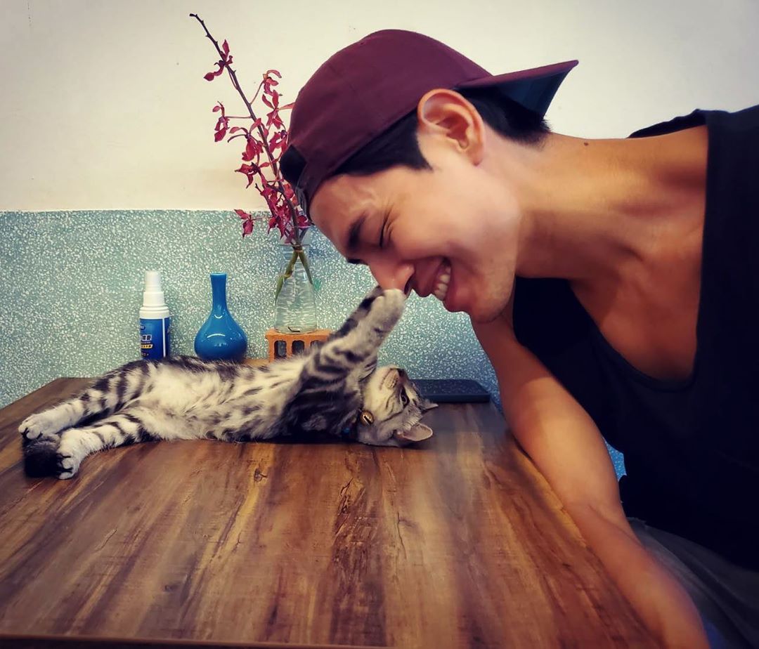 Jeff Chou with a cat