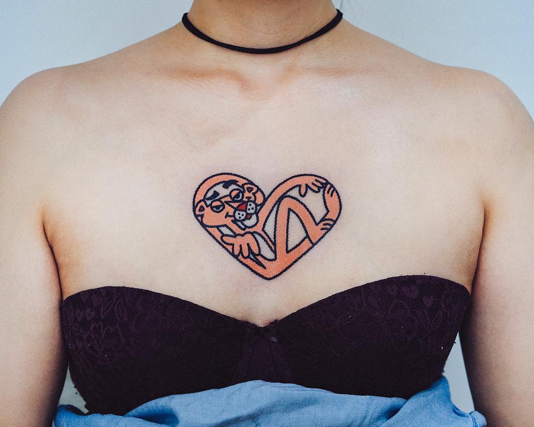 cartoon style tattoo pink panther heart