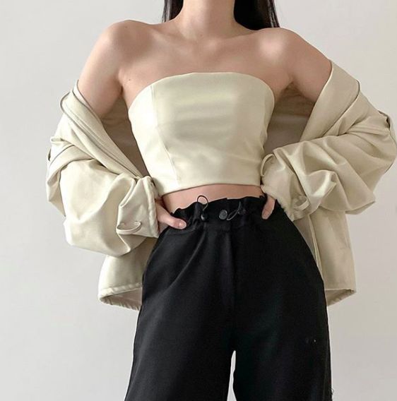 asian girl wearing tube crop top, cardigan and black trousers