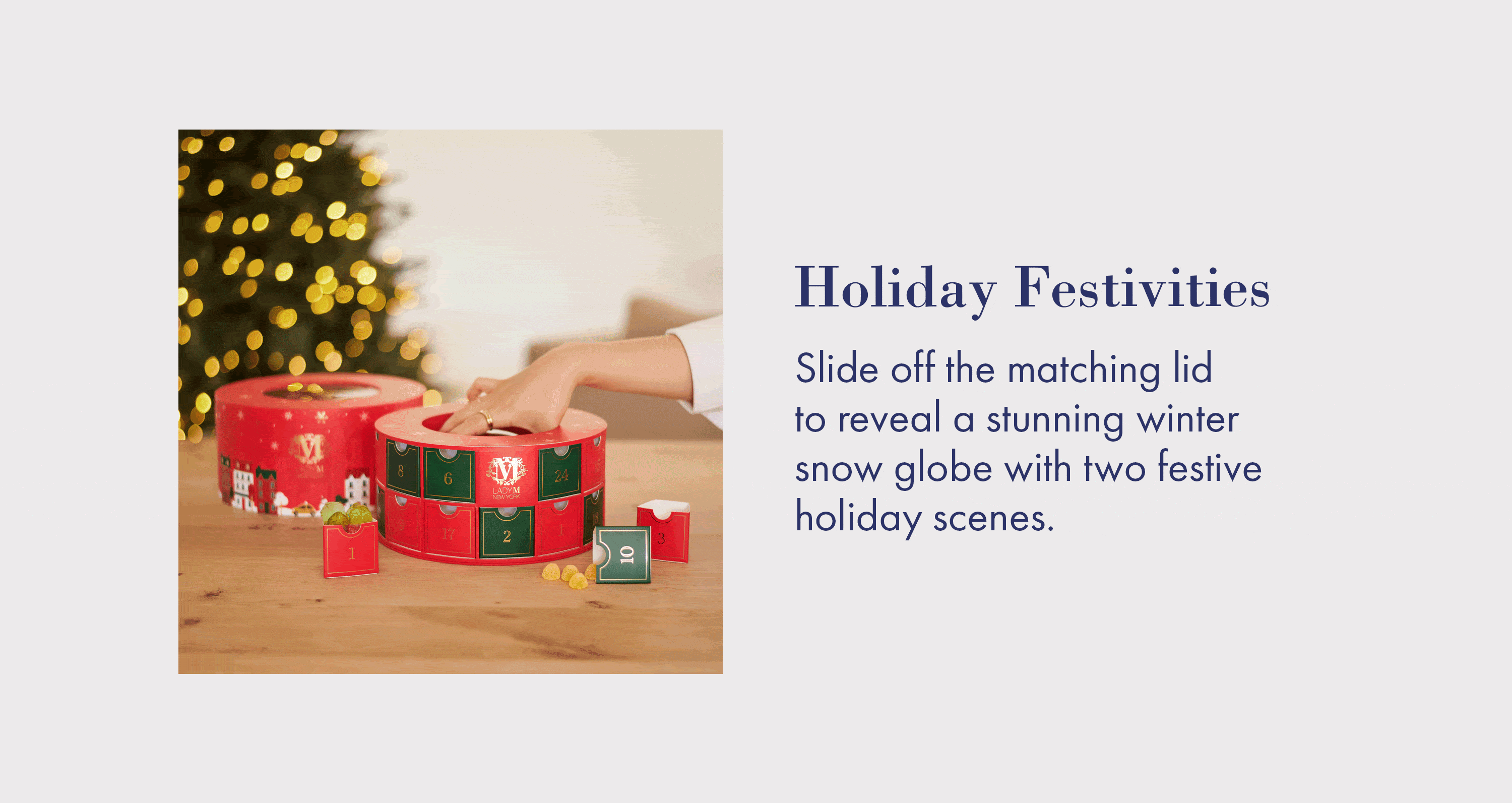 Lady M interactive snow globe