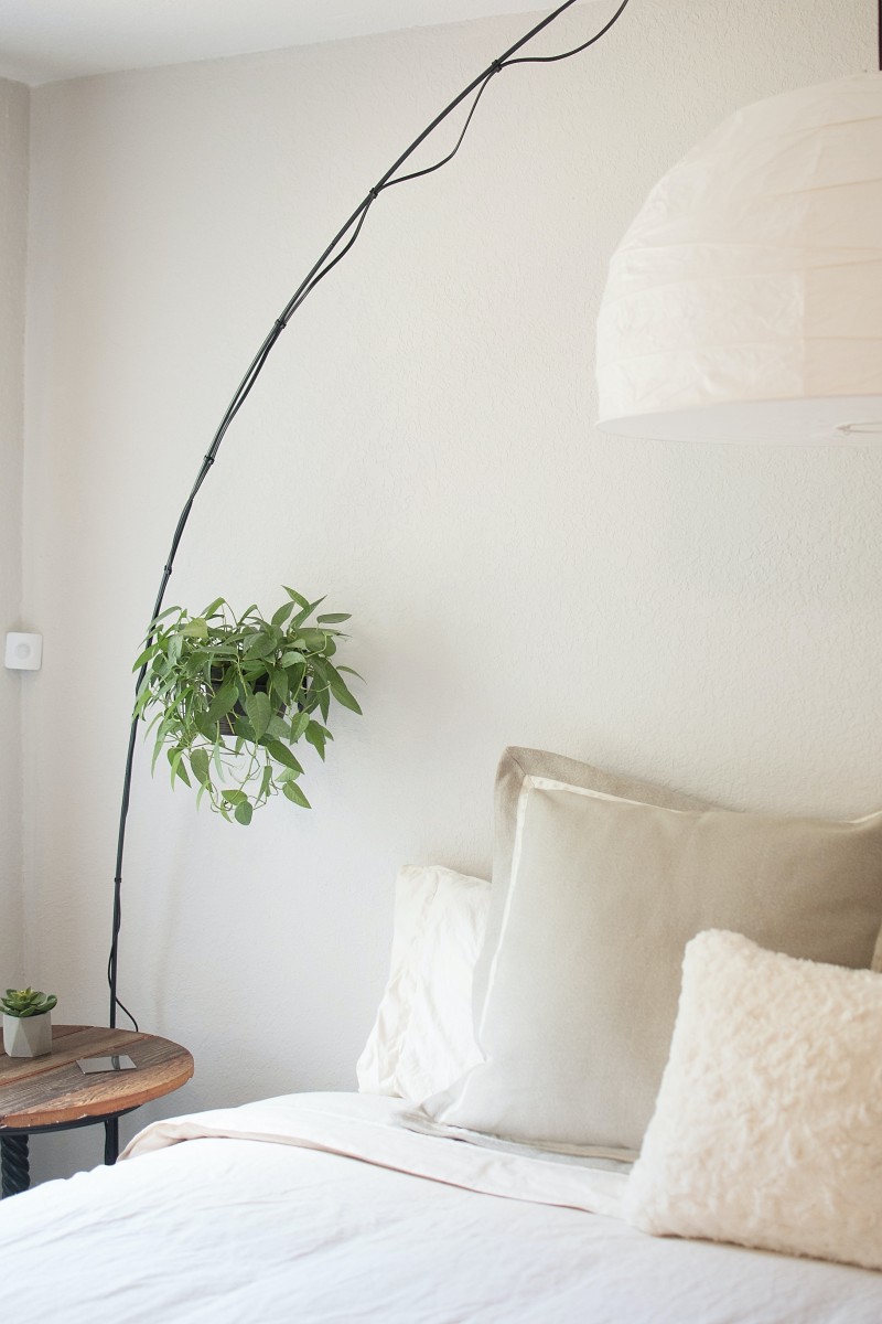 Minimalist bedroom with pillows and blankets