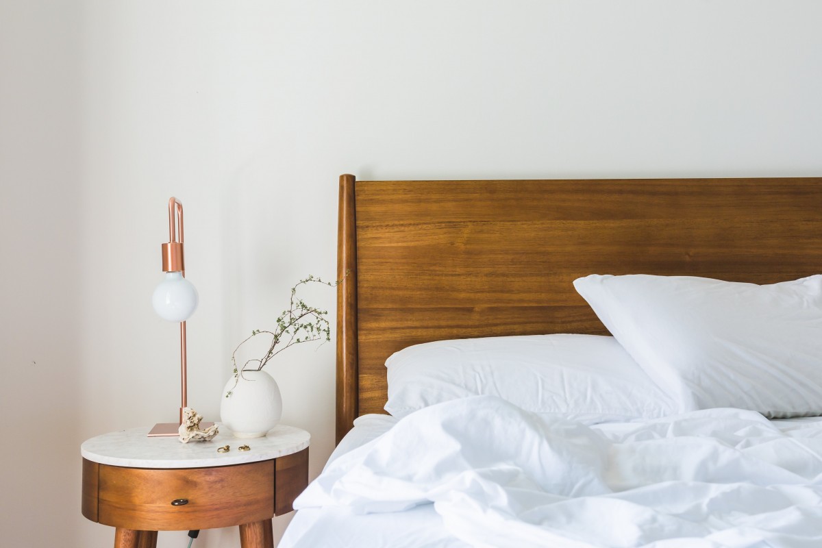 Minimalist bedroom with neat bedside