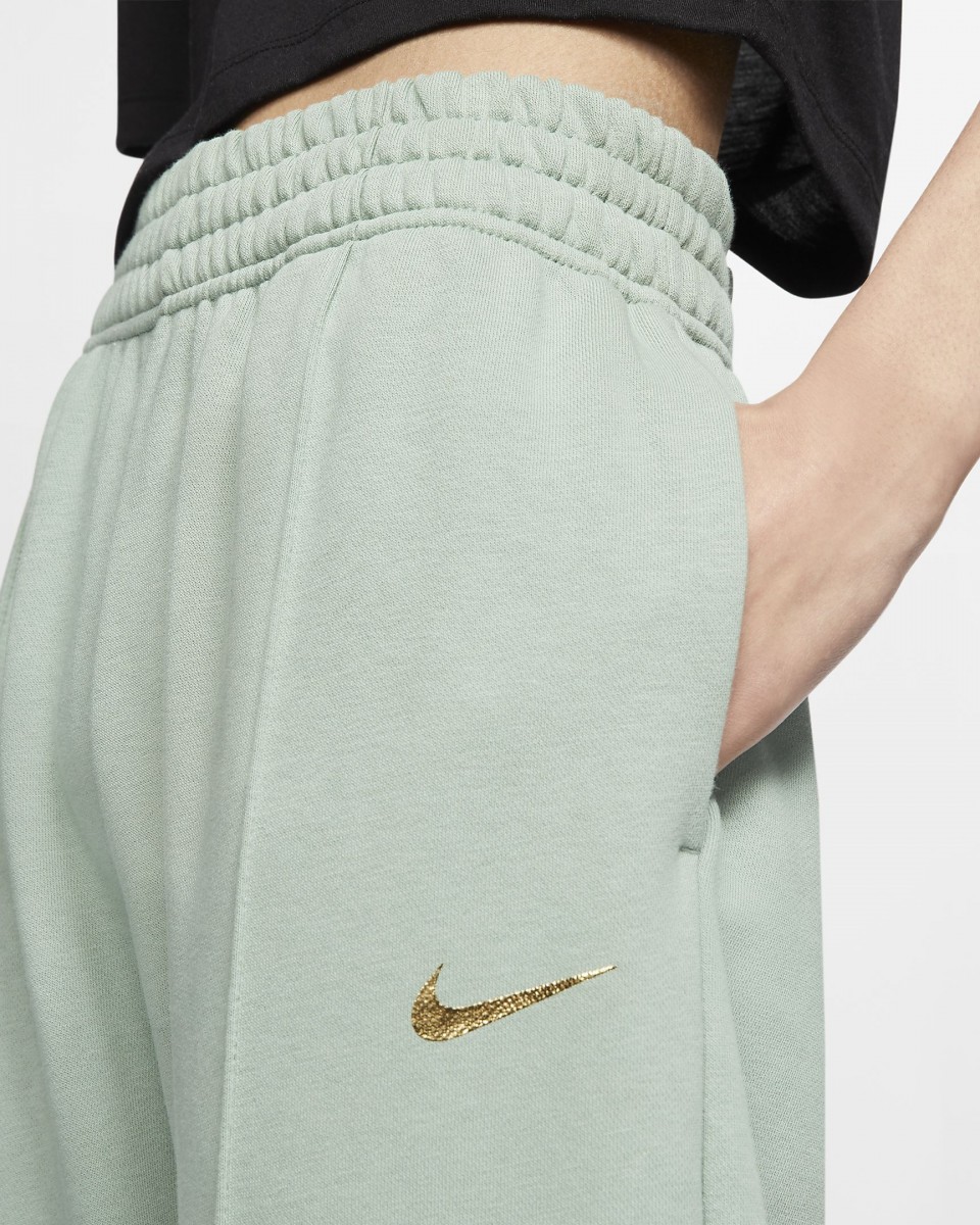 Close up of Silver Pine Nike trousers